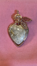 Copper wire wrapped Cotton Candy Agate heart pendant with rose and leaf detail on pink background