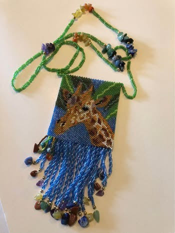 Hand beaded giraffe amulet pouch necklace full view with gemstone chip accents