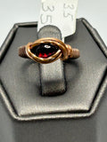Copper wire wrapped garnet teardrop cabochon ring size 3.5 with simple oval frame setting