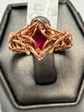 Copper wire wrapped lab created ruby ring size 8 with wide woven vine lattice setting