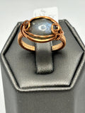 Copper wire wrapped labradorite oval cabochon ring size 6.5 with clean oval frame and double scroll accents