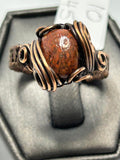 Oxidized copper wire wrapped genuine coprolite fossil ring size 10 with multi-wire scroll setting