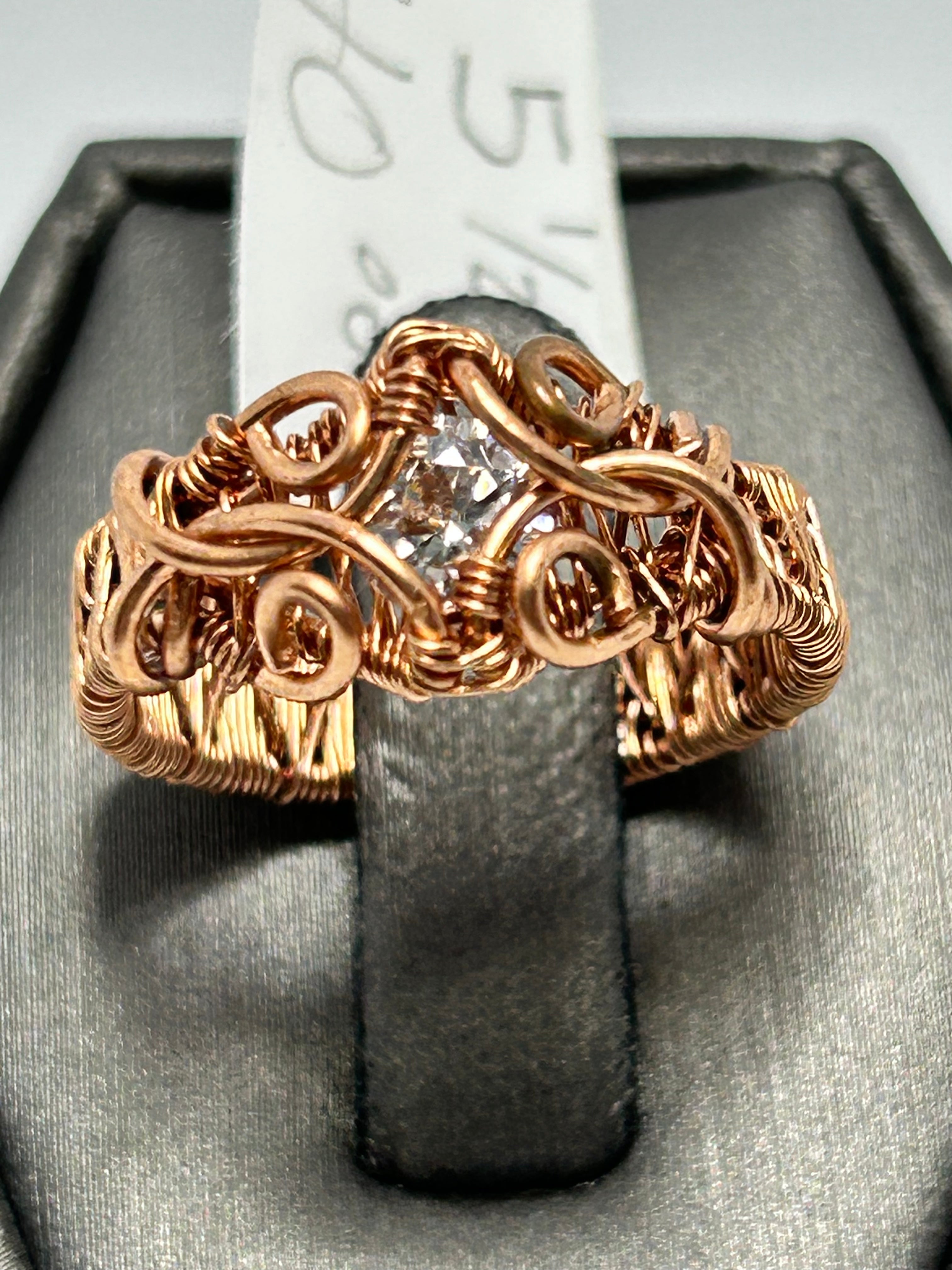 Copper wire wrapped moissanite ring size 5.5 with scroll loop wirework and wide woven band