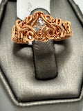 Copper wire wrapped moissanite cushion cut ring size 5 with full woven wire band and scroll tendril accents