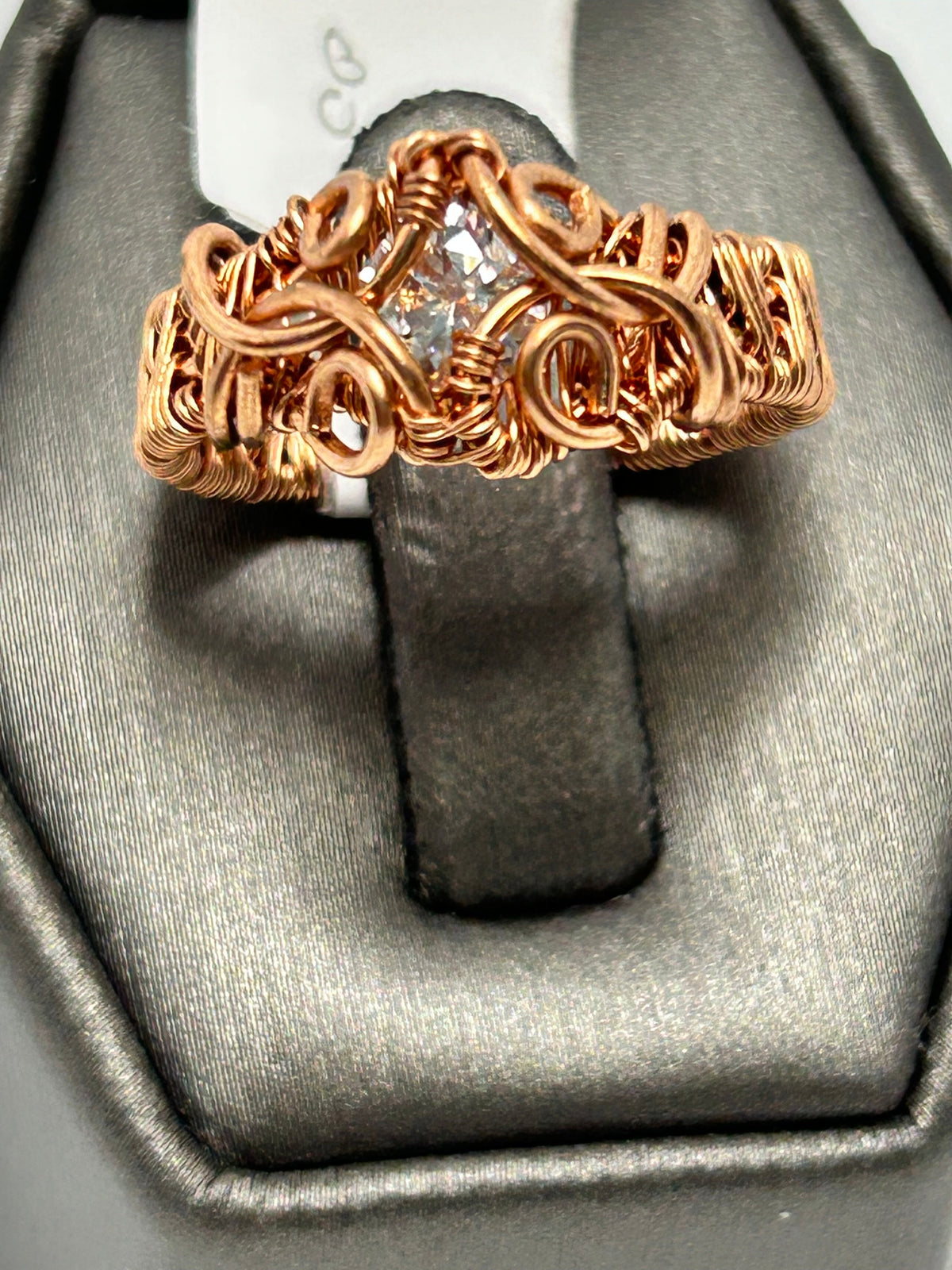 Copper wire wrapped moissanite cushion cut ring size 5 with full woven wire band and scroll tendril accents