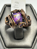 Oxidized copper wire wrapped composite purple turquoise oval cabochon ring size 7 with arch cross setting and spiral curl accents
