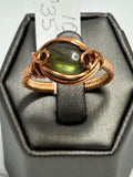 Copper wire wrapped labradorite oval cabochon ring size 10 with eye-shaped frame and rose curl side accents