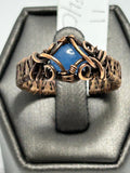 Oxidized copper wire wrapped blue jade diamond-shaped cabochon ring size 11 with tendril scroll accents and wide woven band