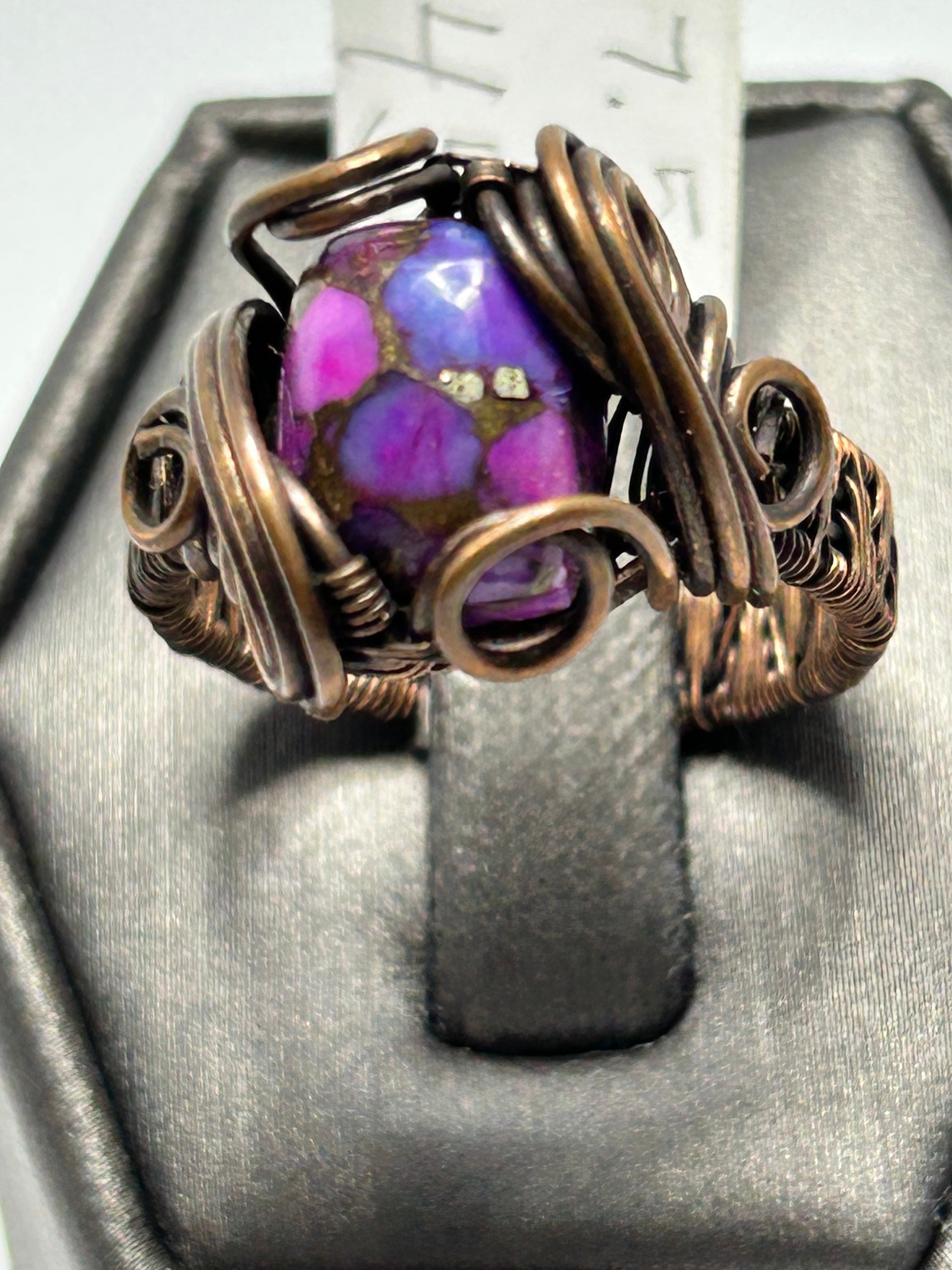 Oxidized copper wire wrapped composite purple turquoise oval cabochon ring size 7.5 with layered cage setting, scroll curl and spiral accents, wide woven band