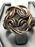 Oxidized copper wire wrapped smoky quartz cushion cut ring size 6.5 with swirling open-weave globe cage and fleur-de-lis scroll accents