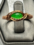 Copper wire wrapped green jade pear-shaped cabochon ring size 7.5 with eye-shaped arch wire frame and twisted wire side accents