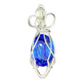 Silver wire wrapped sapphire blue Swarovski crystal pendant with triple-loop bow bail on white background