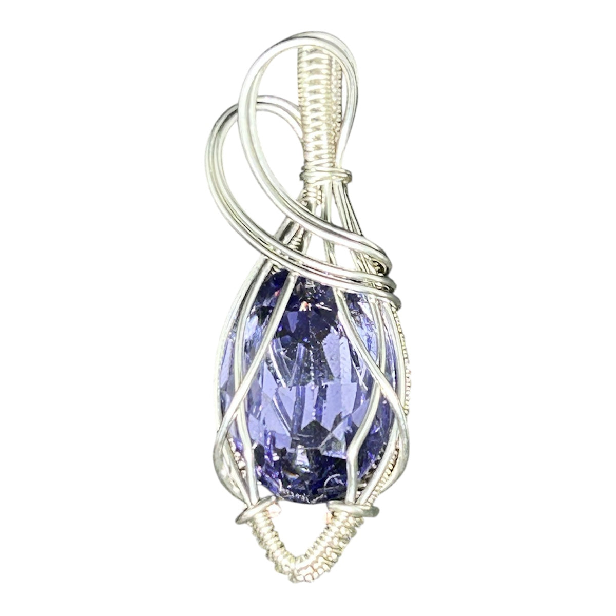 Silver wire wrapped violet Swarovski crystal pendant with asymmetric swirl bail on white background