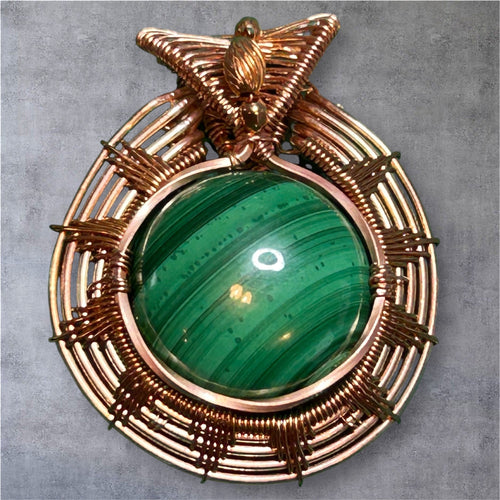 Copper wire wrapped African malachite pendant with butterfly accent, approximately 1.5 inches