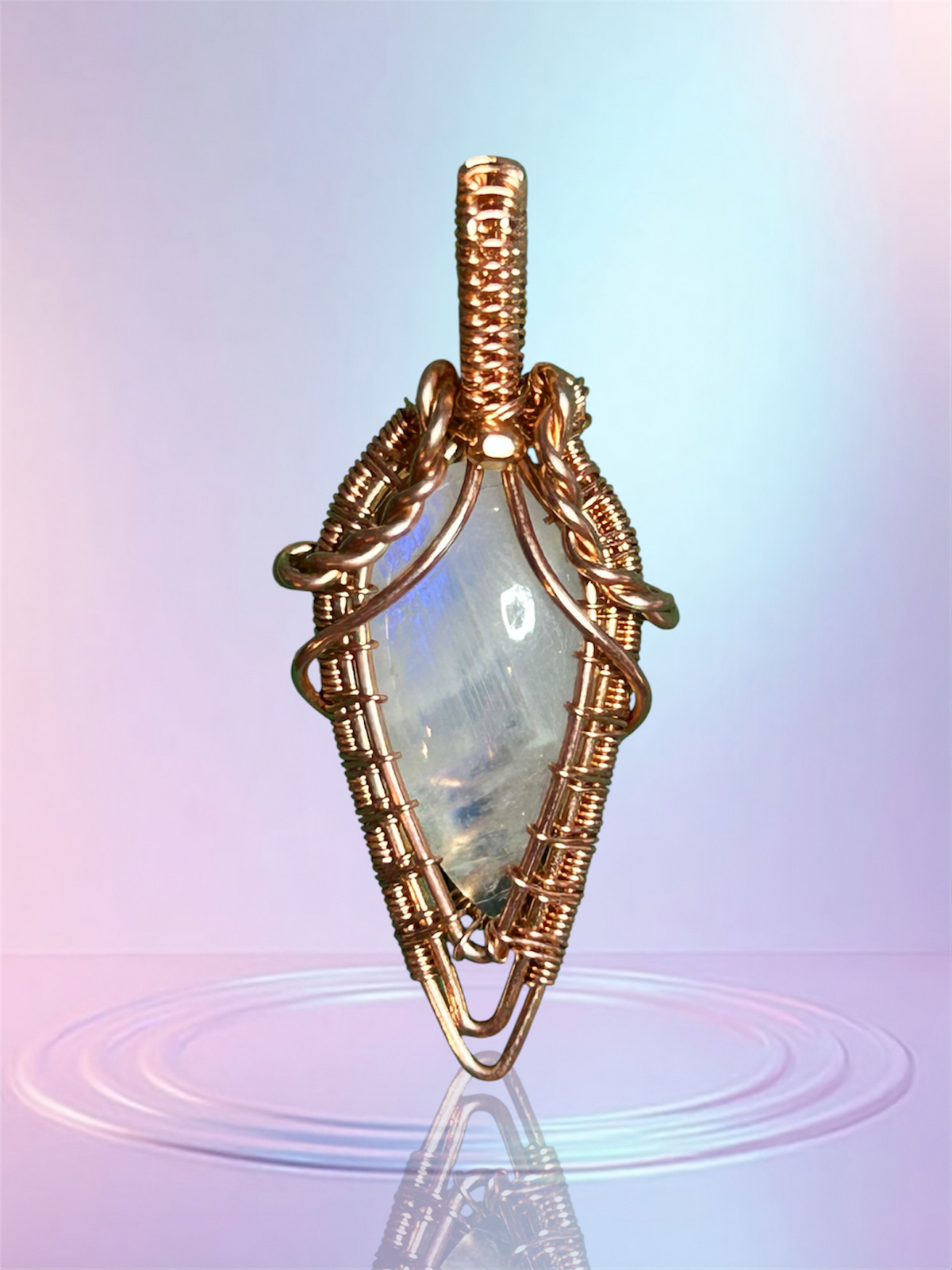 Copper wire wrapped rainbow moonstone marquise pendant with blue flash, braided wire shoulders and wire wrapped bail, handcrafted by KariJKrafts